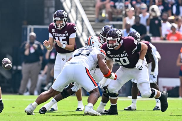 Texas A&M Aggies offensive lineman Trey Zuhn III (60) in action during the first quarter at Kyle Field.