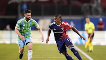 Apr 13, 2024; Frisco, Texas, USA; FC Dallas forward Dante Sealy (11) plays theballdefedne day Seattle Sounders midfielder João Paulo (6) in the second half at Toyota Stadium. Mandatory Credit: Chris Jones-Imagn Images