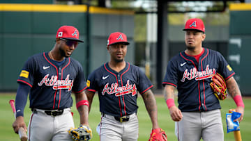 Atlanta Braves players, from left, outfielders Jurickson Profar, and infielders Ozzie Albie and Orlando Arcia, arrive for a spring training workout Thursday, Feb. 27th at CoolToday Park in North Port.