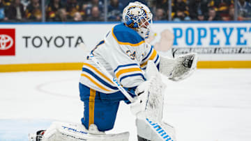 Dec 11, 2025; Vancouver, British Columbia, CAN; Buffalo Sabres goalie Alex Lyon (34) makes a save against the Vancouver Canucks in the third period at Rogers Arena. Mandatory Credit: Bob Frid-Imagn Images