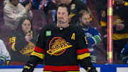 Jan 18, 2025; Vancouver, British Columbia, CAN; Vancouver Canucks forward J.T. Miller (9) smiles during warm up prior to a game against the Edmonton Oilers at Rogers Arena. Mandatory Credit: Bob Frid-Imagn Images