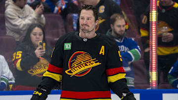 Jan 18, 2025; Vancouver, British Columbia, CAN; Vancouver Canucks forward J.T. Miller (9) smiles during warm up prior to a game against the Edmonton Oilers at Rogers Arena. Mandatory Credit: Bob Frid-Imagn Images