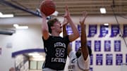 Guerin Catholic junior forward Bryson Cardinal (35) shoots the ball 