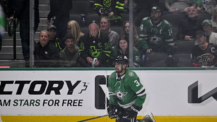 Apr 8, 2025; Dallas, Texas, USA; Dallas Stars defenseman Matt Dumba (3) looks on as the Vancouver Canucks celebrate the victory over the Stars in the overtime period at the American Airlines Center. Mandatory Credit: Jerome Miron-Imagn Images