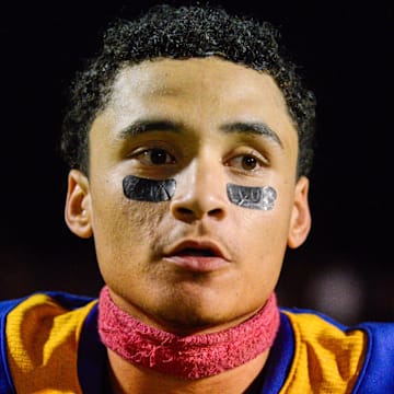 North Side High School athlete Javonte Smith (25) answers questions from media after North Side defeated hometown rivals South Side 28-7 at North Side Stadium in Jackson, Tenn.