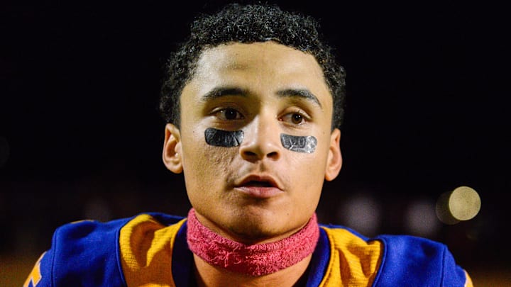 North Side High School athlete Javonte Smith (25) answers questions from media after North Side defeated hometown rivals South Side 28-7 at North Side Stadium in Jackson, Tenn.