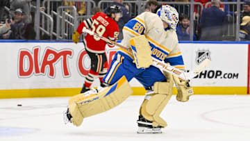 Feb 8, 2025; St. Louis, Missouri, USA;  St. Louis Blues goaltender Jordan Binnington (50) reacts after making the game winning save against Chicago Blackhawks left wing Tyler Bertuzzi (59) during the 10th round of shootouts at Enterprise Center. Mandatory Credit: Jeff Curry-Imagn Images