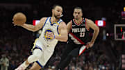 Apr 11, 2025; Portland, Oregon, USA; Golden State Warriors guard Stephen Curry (30) drives to the basket during the second half against Portland Trail Blazers forward Toumani Camara (33) at Moda Center. Mandatory Credit: Troy Wayrynen-Imagn Images