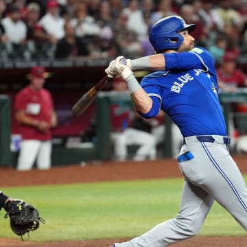 Toronto Blue Jays outfielder Kevin Kiermaier (39) hits a grand slam home run against the Arizona Diamondbacks during the fourth inning at Chase Field.