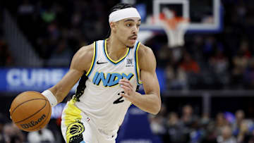 Jan 16, 2025; Detroit, Michigan, USA;  Indiana Pacers guard Andrew Nembhard (2) dribbles in the second half against the Detroit Pistons at Little Caesars Arena. Mandatory Credit: Rick Osentoski-Imagn Images