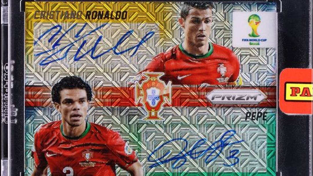 An ungraded one-of-one 2014 Panini Prizm World Cup Combo Signatures El Samba Prizm Cristiano Ronaldo & Pepe Card