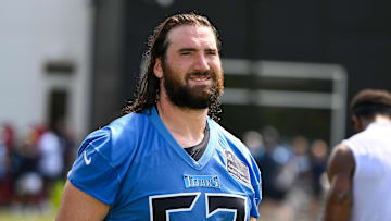 Jul 24, 2025; Nashville, TN, USA;  Tennessee Titans center Corey Levin (62) walks off the field during training camp at Ascension Saint Thomas Sports Park. Mandatory Credit: Steve Roberts-Imagn Images