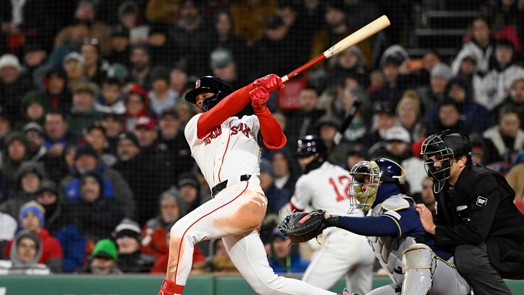Apr 7, 2026; Boston, Massachusetts, USA; Boston Red Sox center fielder Ceddanne Rafaela (3) hits a single against the Milwaukee Brewers during fifth inning at Fenway Park. Mandatory Credit: Eric Canha-Imagn Images