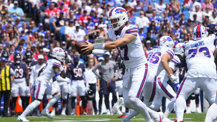 Aug 10, 2024; Orchard Park, New York, USA; Buffalo Bills quarterback Josh Allen (17) looks to hand the ball off against the Chicago Bears during the first half at Highmark Stadium. Mandatory Credit: Gregory Fisher-USA TODAY Sports