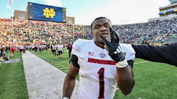 Sep 7, 2024; South Bend, Indiana, USA; Northern Illinois Huskies running back Antario Brown (1) celebrates after the Huskies defeated the Notre Dame Fighting Irish 16-14 at Notre Dame Stadium. Mandatory Credit: Matt Cashore-Imagn Images