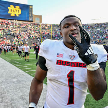 Sep 7, 2024; South Bend, Indiana, USA; Northern Illinois Huskies running back Antario Brown (1) celebrates after the Huskies defeated the Notre Dame Fighting Irish 16-14 at Notre Dame Stadium. Mandatory Credit: Matt Cashore-Imagn Images