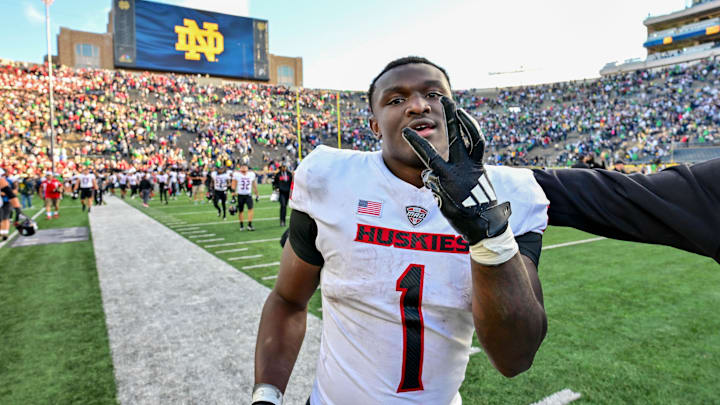 Sep 7, 2024; South Bend, Indiana, USA; Northern Illinois Huskies running back Antario Brown (1) celebrates after the Huskies defeated the Notre Dame Fighting Irish 16-14 at Notre Dame Stadium. Mandatory Credit: Matt Cashore-Imagn Images