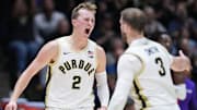 Purdue Boilermakers guard Fletcher Loyer (2) yells in excitement with guard Braden Smith (3) 