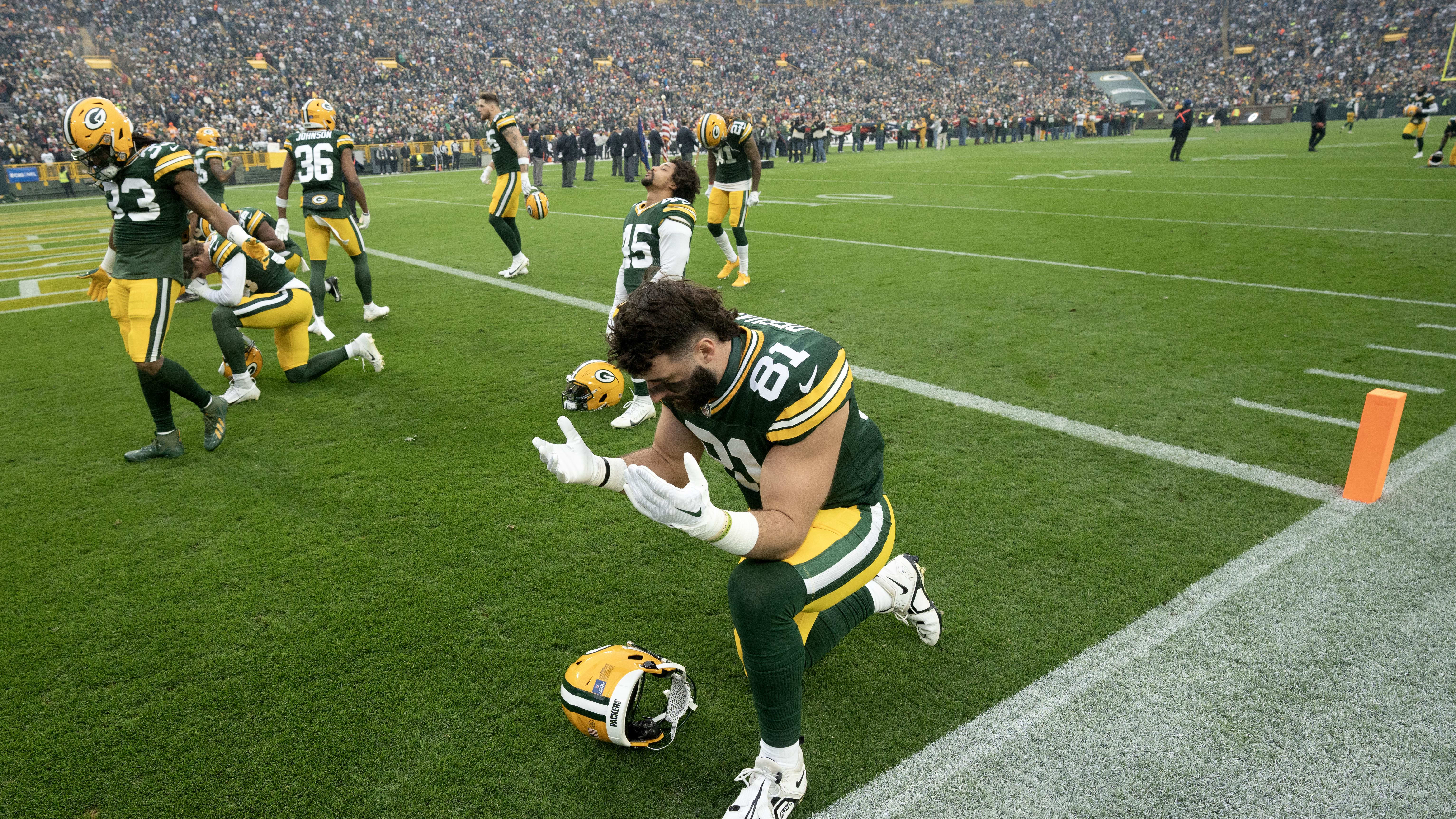 Dec 17, 2023; Green Bay, Wisconsin, USA;  Green Bay Packers tight end Josiah Deguara (81) takes a