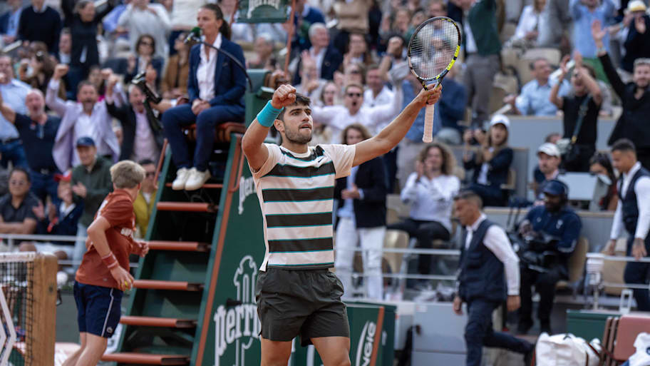 Alcaraz reacts to a point during the men’s singles final against Sinner on day 15 at Roland Garros Stadium.  | Susan Mullane-Imagn Images