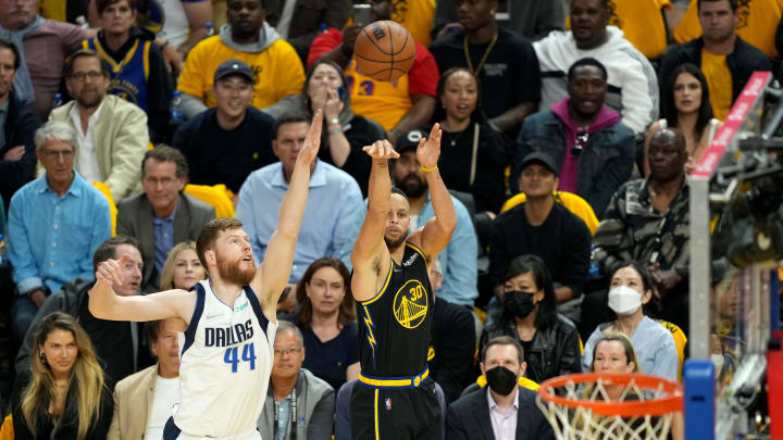 May 18, 2022; San Francisco, California, USA; Golden State Warriors guard Stephen Curry (30) shoots against Dallas Mavericks forward Davis Bertans (44) during the first quarter of game one of the 2022 western conference finals at Chase Center. 