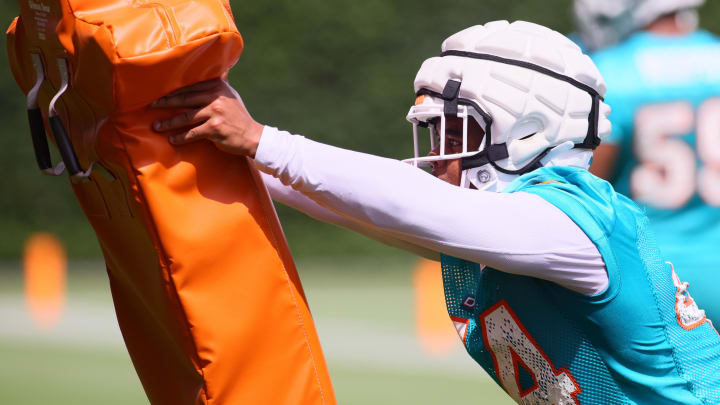 Miami Dolphins linebacker Chop Robinson (44) works out during training camp at Baptist Health Training Complex.