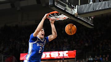 Jan 18, 2025; Chestnut Hill, Massachusetts, USA; Duke Blue Devils guard Cooper Flagg (2) dunks the ball against the Boston College Eagles during the first half at Conte Forum. Mandatory Credit: Eric Canha-Imagn Images