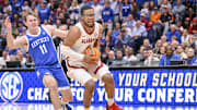 Mar 14, 2025; Nashville, TN, USA;  Alabama Crimson Tide guard Chris Youngblood (8) drives to the basket against the Kentucky Wildcats during the first half at Bridgestone Arena. Mandatory Credit: Steve Roberts-Imagn Images