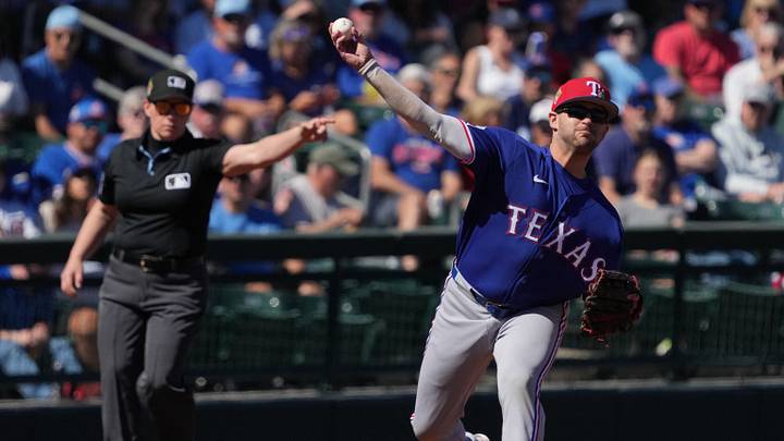 Feb 21, 2026; Mesa, Arizona, USA; Texas Rangers third baseman Jonah Bride (37) makes the play for an out against the Chicago Cubs in the second inning at Sloan Park. Mandatory Credit: Rick Scuteri-Imagn Images