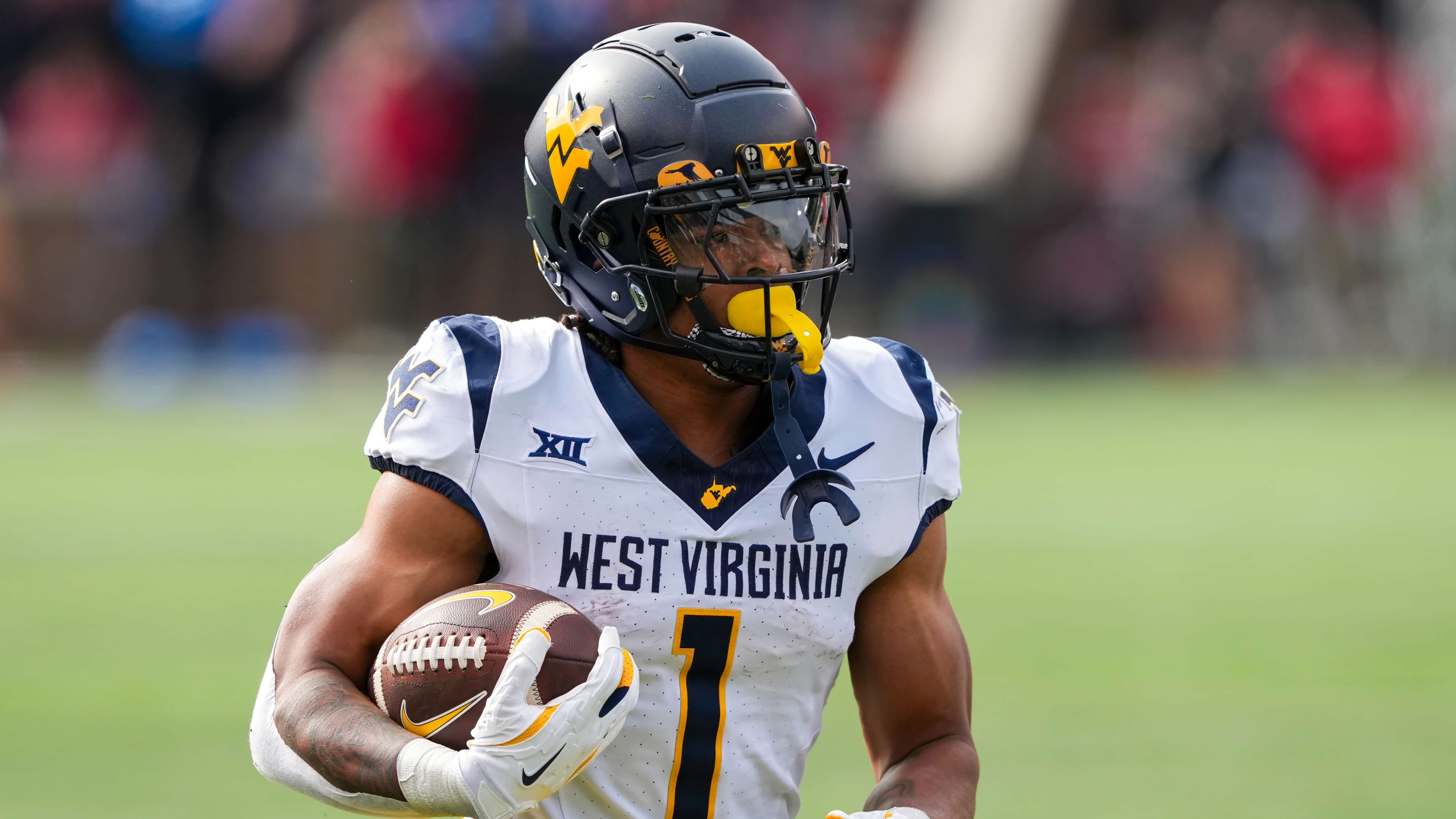 A slew of West Virginia football starters, key players announce their return to the program