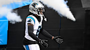 Dec 15, 2024; Charlotte, North Carolina, USA;  Carolina Panthers cornerback Jaycee Horn (8) runs on to the field before the game at Bank of America Stadium. Mandatory Credit: Bob Donnan-Imagn Images