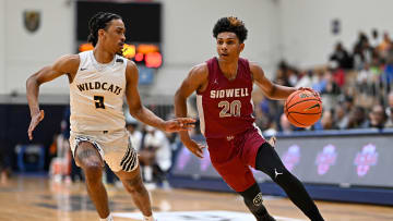 Apr 8, 2023; Washington, DC, USA; Sidwell Friends (DC) guard Acaden Lewis (20) drives to the basket against Wheeler (GA) guard Damion Mitchell Jr (2) at Georgetown University. Mandatory Credit: Reggie Hildred-USA TODAY Sports