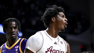 Jan 18, 2025; College Station, Texas, USA; Texas A&M Aggies forward Solomon Washington (9) reacts during the first half against the LSU Tigers at Reed Arena. Mandatory Credit: Maria Lysaker-Imagn Images 