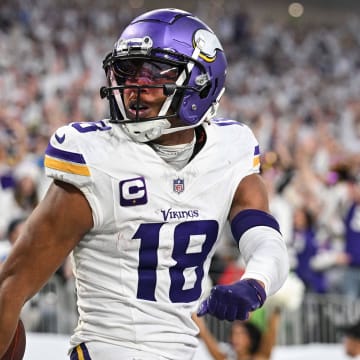 Dec 24, 2023; Minneapolis, Minnesota, USA; Minnesota Vikings wide receiver Justin Jefferson (18) reacts after scoring a touchdown during the second quarter against the Detroit Lions at U.S. Bank Stadium. Mandatory Credit: Jeffrey Becker-USA TODAY Sports