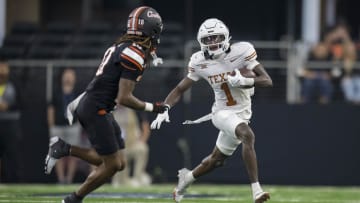 Dec 2, 2023; Arlington, TX, USA; Oklahoma State Cowboys cornerback Kale Smith (10) and Texas Longhorns wide receiver Xavier Worthy (1) in action during the game between the Texas Longhorns and the Oklahoma State Cowboys at AT&T Stadium. Mandatory Credit: Jerome Miron-USA TODAY Sports