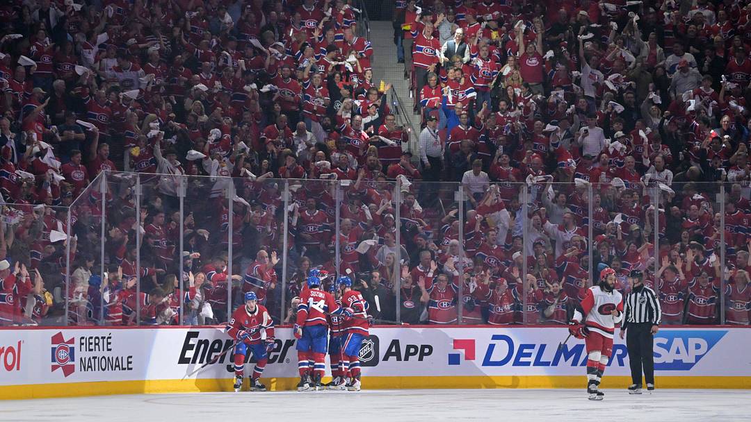 May 25, 2026; Montreal, Quebec, CAN; Montreal Canadiens players celebrate after a goal during the second period against the Carolina Hurricanes in game three of the Eastern Conference Final of the 2026 Stanley Cup Playoffs at Bell Centre. Mandatory Credit: Eric Bolte-Imagn Images
