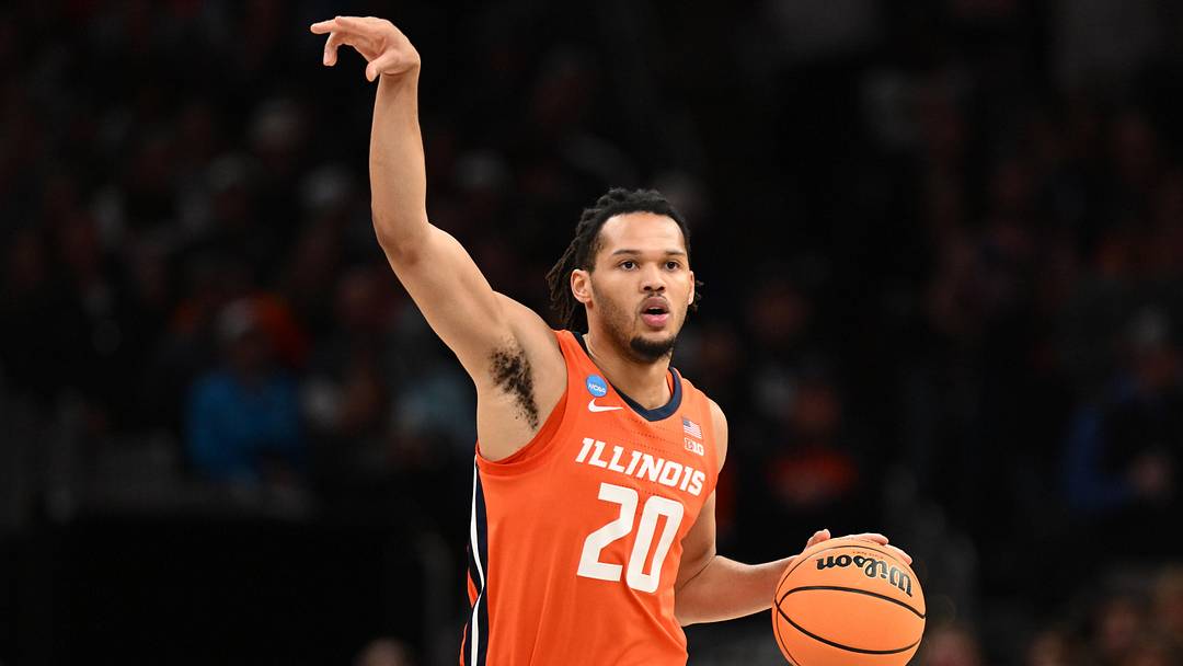 Mar 30, 2024; Boston, MA, USA; Illinois Fighting Illini forward Ty Rodgers (20) dribbles the ball against the Connecticut Huskies in the finals of the East Regional of the 2024 NCAA Tournament at TD Garden. Mandatory Credit: Brian Fluharty-Imagn Images Mar 30, 2024; Boston, MA, USA; Illinois Fighting Illini forward Ty Rodgers (20) dribbles the ball against the Connecticut Huskies in the finals of the East Regional of the 2024 NCAA Tournament at TD Garden. Mandatory Credit: Brian Fluharty-Imagn Images