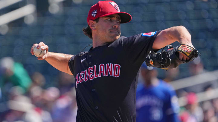 Mar 2, 2024; Goodyear, Arizona, USA; Cleveland Guardians starting pitcher Shane Bieber (57) pitches against the Kansas City Royals during the first inning at Goodyear Ballpark. Mandatory Credit: Joe Camporeale-USA TODAY Sports