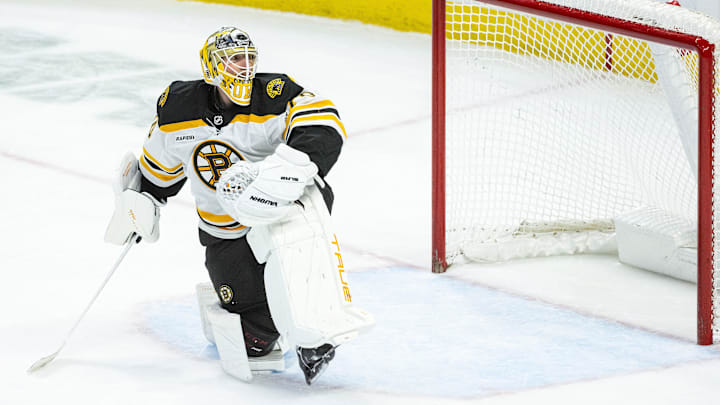Mar 13, 2025; Ottawa, Ontario, CAN; Boston Bruins goalie Joonas Korpisalo (70) stretches during a break in action in the third period against the Ottawa Senators at the Canadian Tire Centre. Mandatory Credit: Marc DesRosiers-Imagn Images