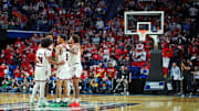 Mar 20, 2025; Lexington, KY, USA; The Louisville Cardinals huddle on the court during the second half against the Creighton Bluejays in the first round of the NCAA Tournament at Rupp Arena. Mandatory Credit: Aaron Doster-Imagn Images