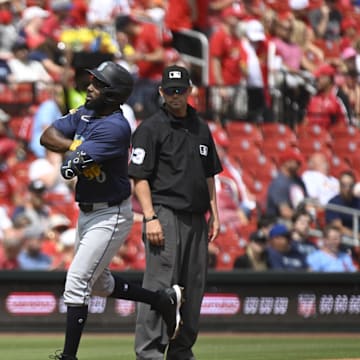 Seattle Mariners left fielder Randy Arozarena (56) gestures to the dug out after hitting a two-run home run against the St. Louis Cardinals during the second inning at Busch Stadium on Sept 8.