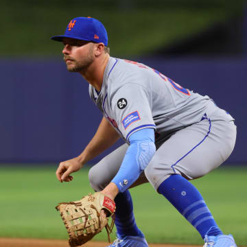 Jul 19, 2024; Miami, Florida, USA; New York Mets first baseman Pete Alonso (20) plays his position against the Miami Marlins during the eighth inning at loanDepot Park. Mandatory Credit: Sam Navarro-USA TODAY Sports