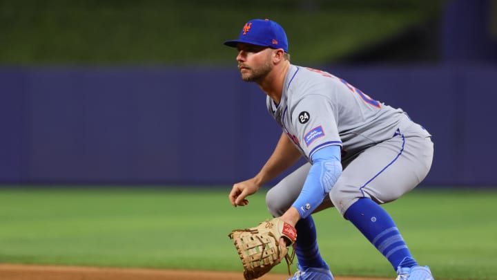 Jul 19, 2024; Miami, Florida, USA; New York Mets first baseman Pete Alonso (20) plays his position against the Miami Marlins during the eighth inning at loanDepot Park. Mandatory Credit: Sam Navarro-USA TODAY Sports