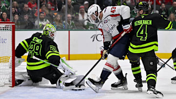 Dec 16, 2024; Dallas, Texas, USA; Dallas Stars goaltender Jake Oettinger (29) and defenseman Miro Heiskanen (4) and Washington Capitals right wing Tom Wilson (43) in action during the game between the Dallas Stars and the Washington Capitals at American Airlines Center. Mandatory Credit: Jerome Miron-Imagn Images