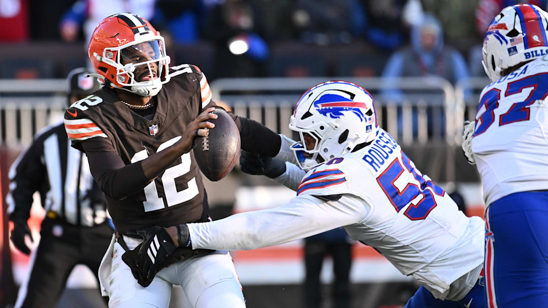 Dec 21, 2025; Cleveland, Ohio, USA; Buffalo Bills defensive end Greg Rousseau (50) pressures Cleveland Browns quarterback Shedeur Sanders (12) at Huntington Bank Field.