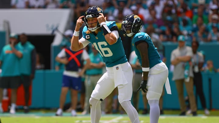 Sep 8, 2024; Miami Gardens, Florida, USA; Jacksonville Jaguars quarterback Trevor Lawrence (16) reacts from the field against the Miami Dolphins during the first quarter at Hard Rock Stadium. Mandatory Credit: Sam Navarro-Imagn Images