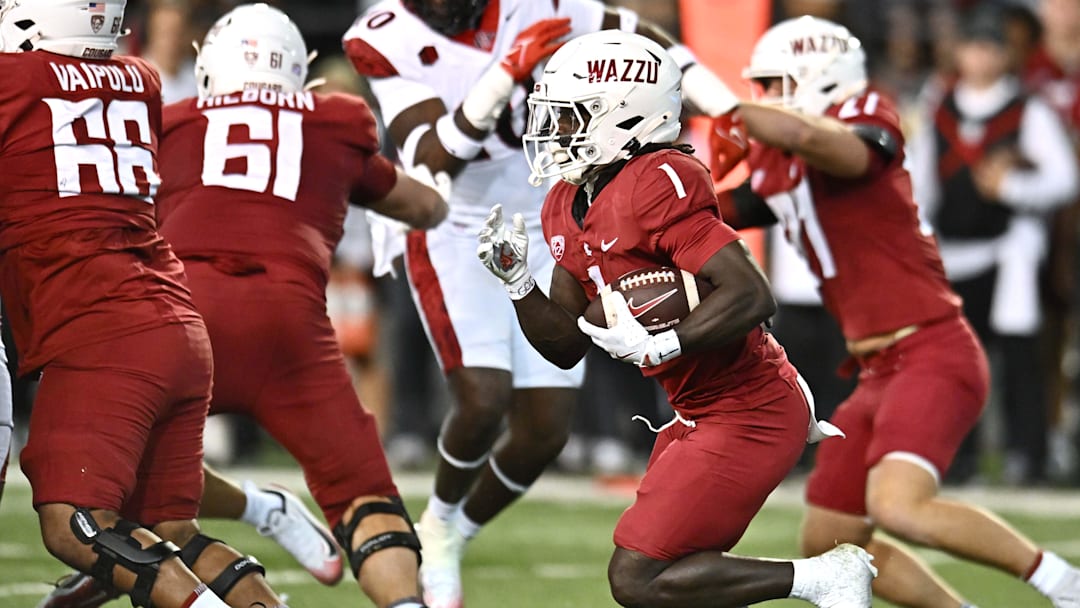 Sep 6, 2025; Pullman, Washington, USA; Washington State Cougars running back Angel Johnson (1) carries the ball against the San Diego State Aztecs in the first half at Gesa Field at Martin Stadium. Mandatory Credit: James Snook-Imagn Images