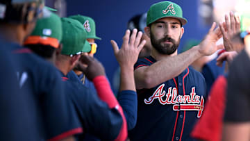  Atlanta Braves starting pitcher Spencer Strider (99) is greeted by his teammates after leaving the game against the Boston Red Sox during spring training at CoolToday Park.