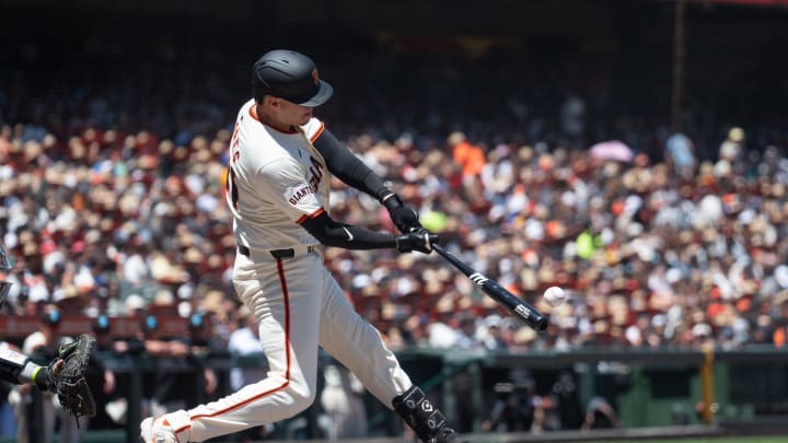 Jun 16, 2024; San Francisco, California, USA;  San Francisco Giants first base Wilmer Flores (41) hits a double during the fourth inning against the Los Angeles Angels at Oracle Park.