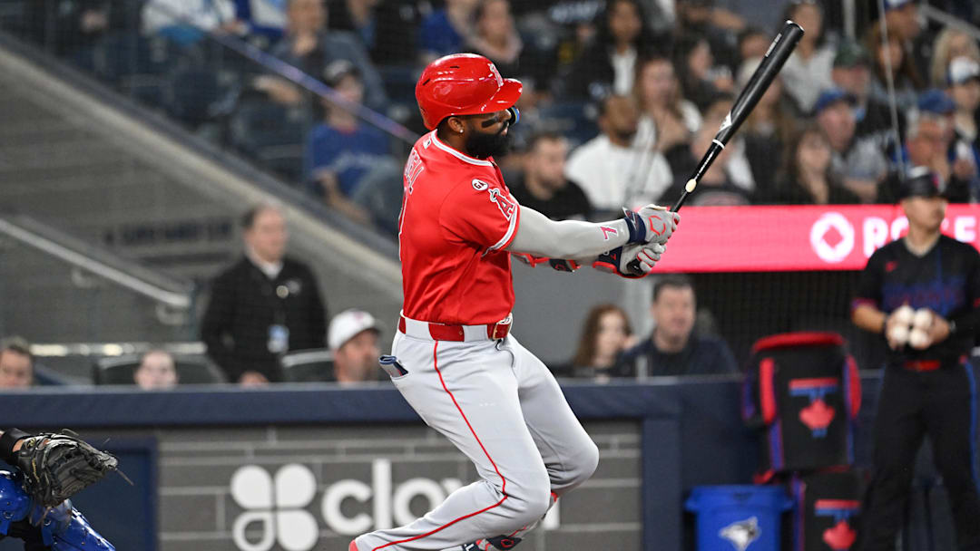 May 8, 2026; Toronto, Ontario, CAN;  Los Angeles Angels right fielder Jo Adell (7) hits a single against the Toronto Blue Jays in the fifth inning at Rogers Centre. Mandatory Credit: Dan Hamilton-Imagn Images